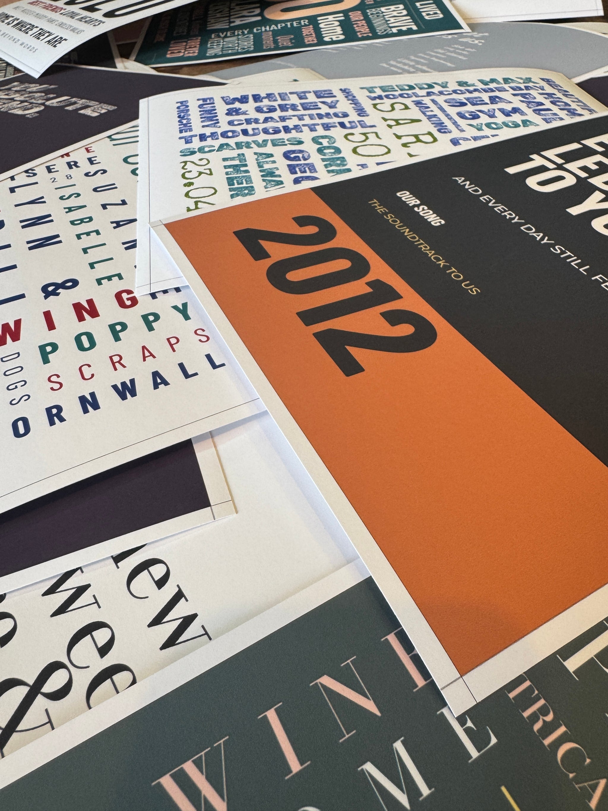 Personalised Word Art prints showing varied colours, lettering and meaningful dates