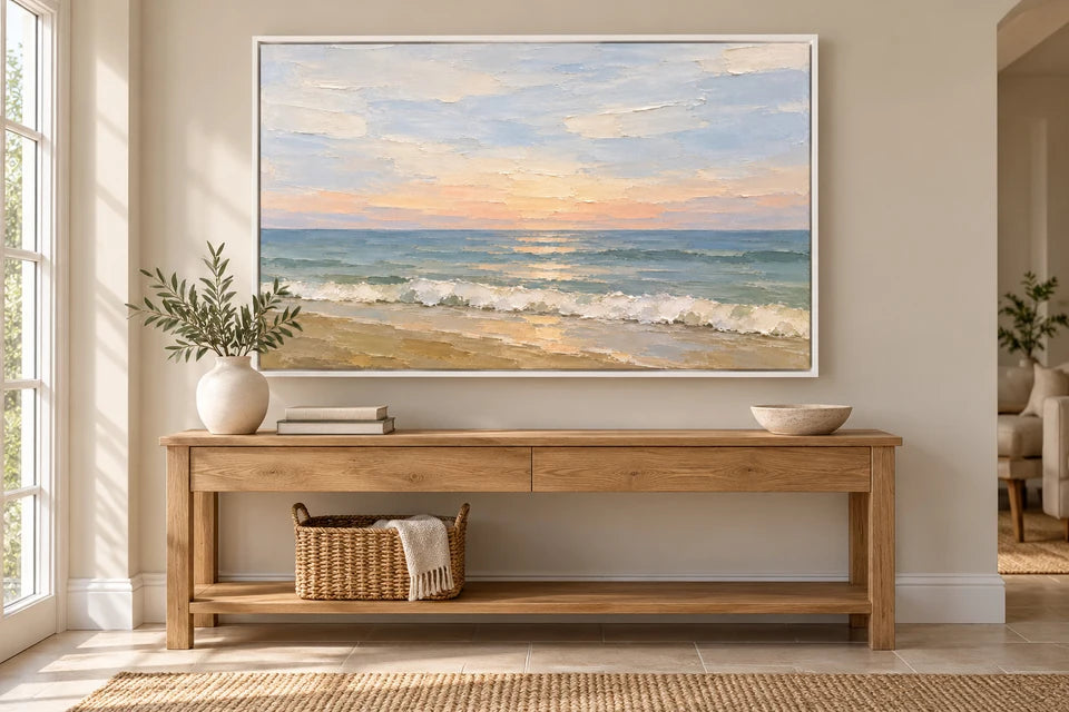 Dawn seascape in a white floating frame above an oak console, a room visualisation