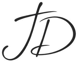 Original example JD handwritten initials mark in charcoal ink on a transparent background.
