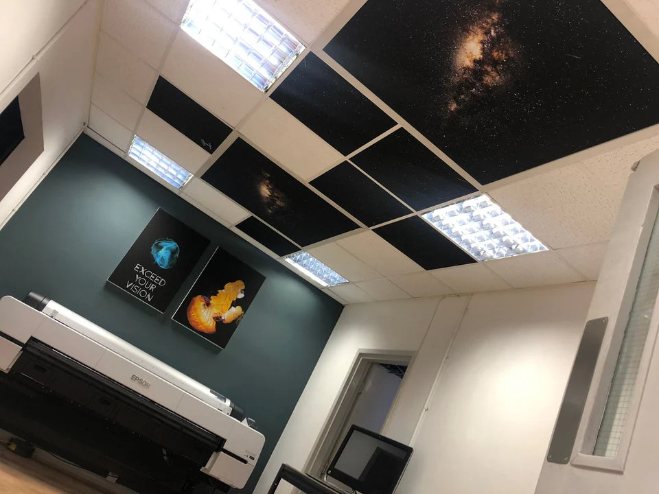 View into our print room with printers and overhead lighting