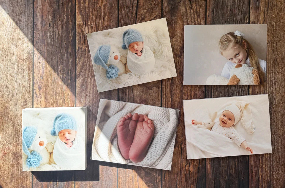 A collection of photo canvases photographed in workshop light