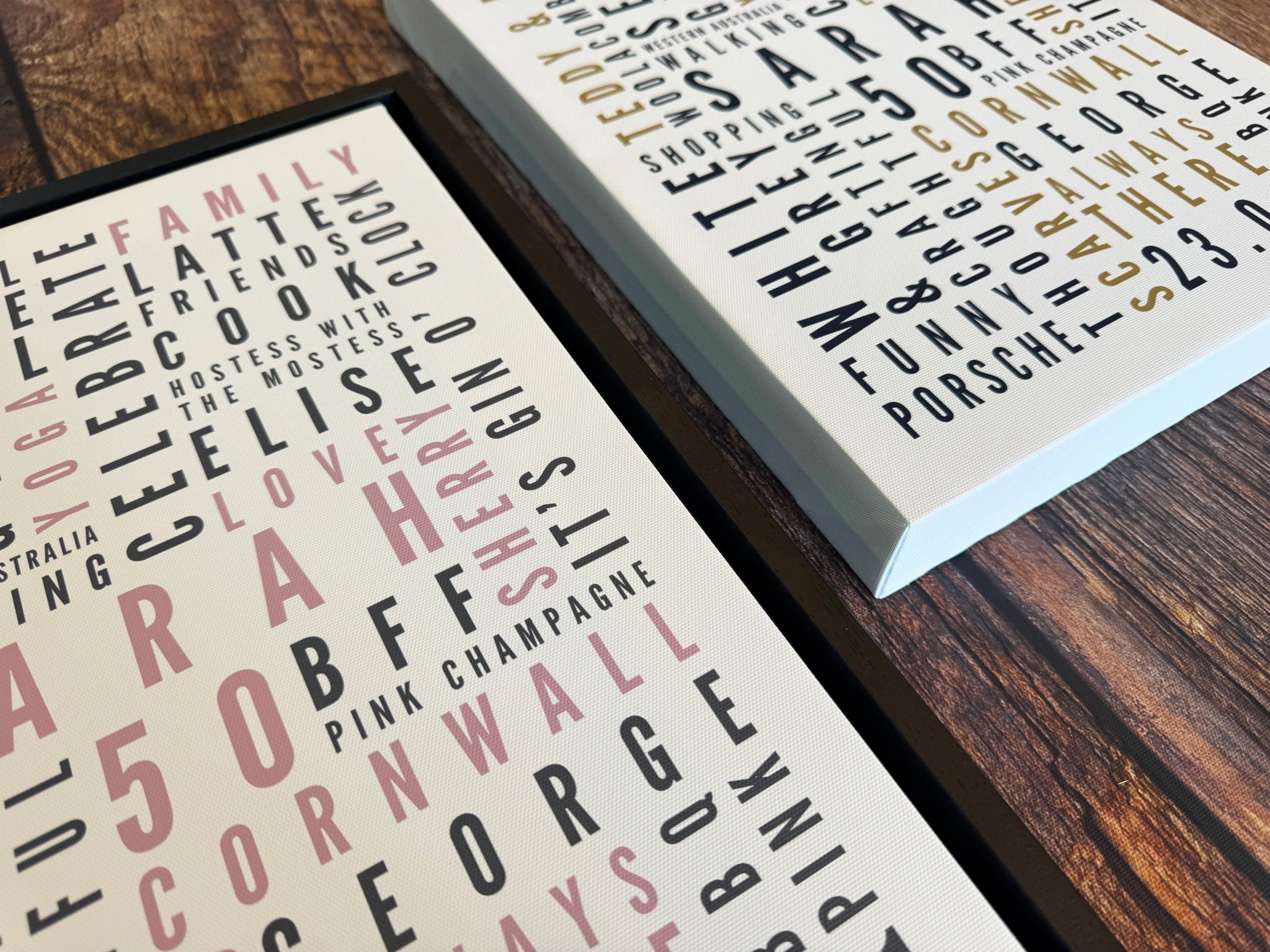 A close comparison of two personalised Word Art canvases, one inside a black floating frame.