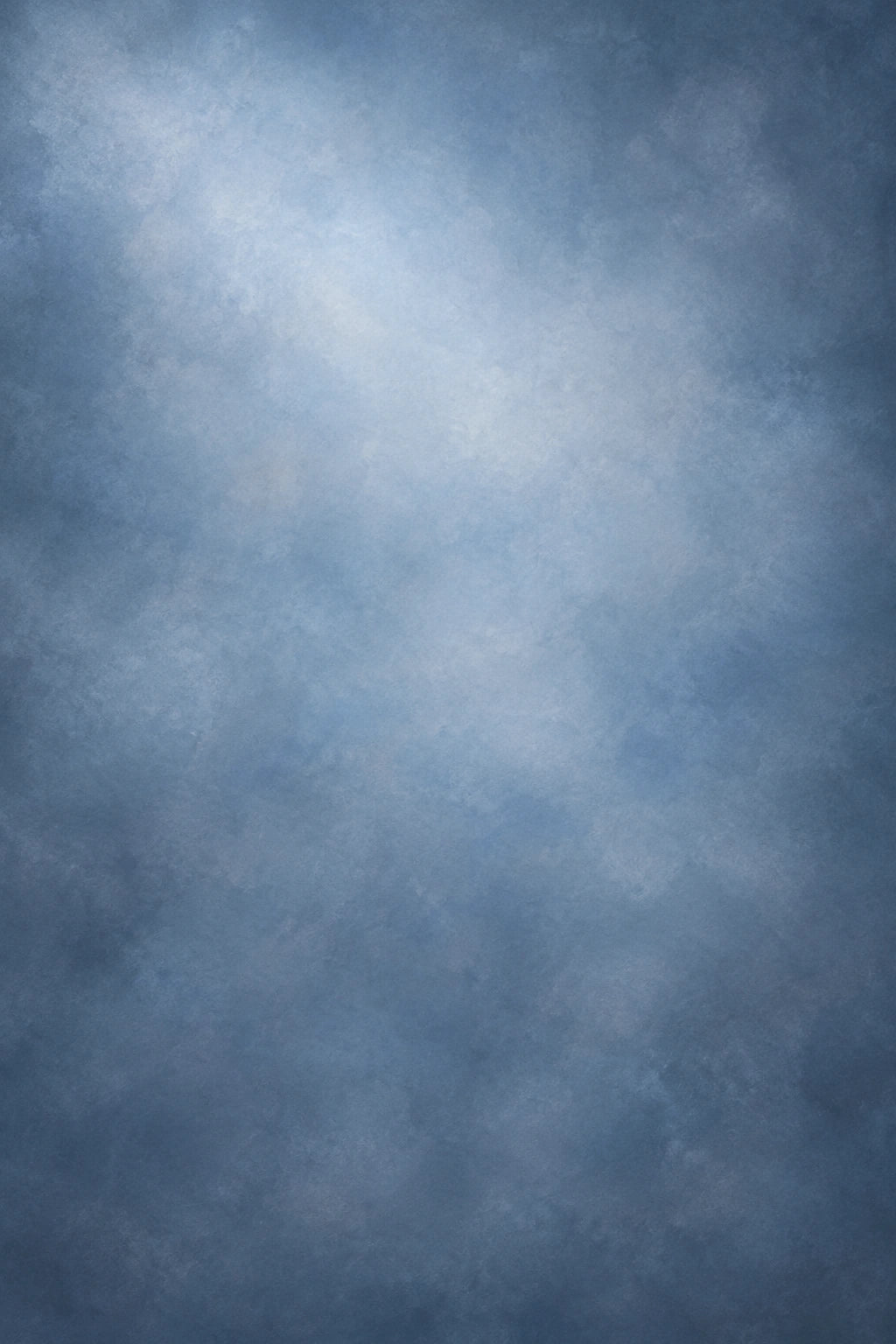 Child-free portrait backdrop with softly mottled slate and powder blue tones.