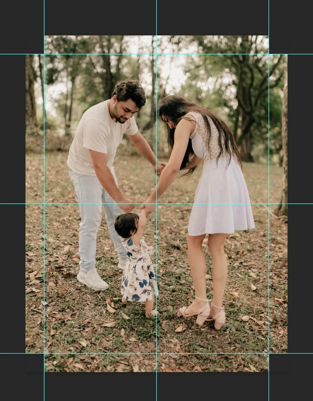 The same family photograph prepared for a 12 by 16 inch canvas, with visible composition and gallery-frame guides