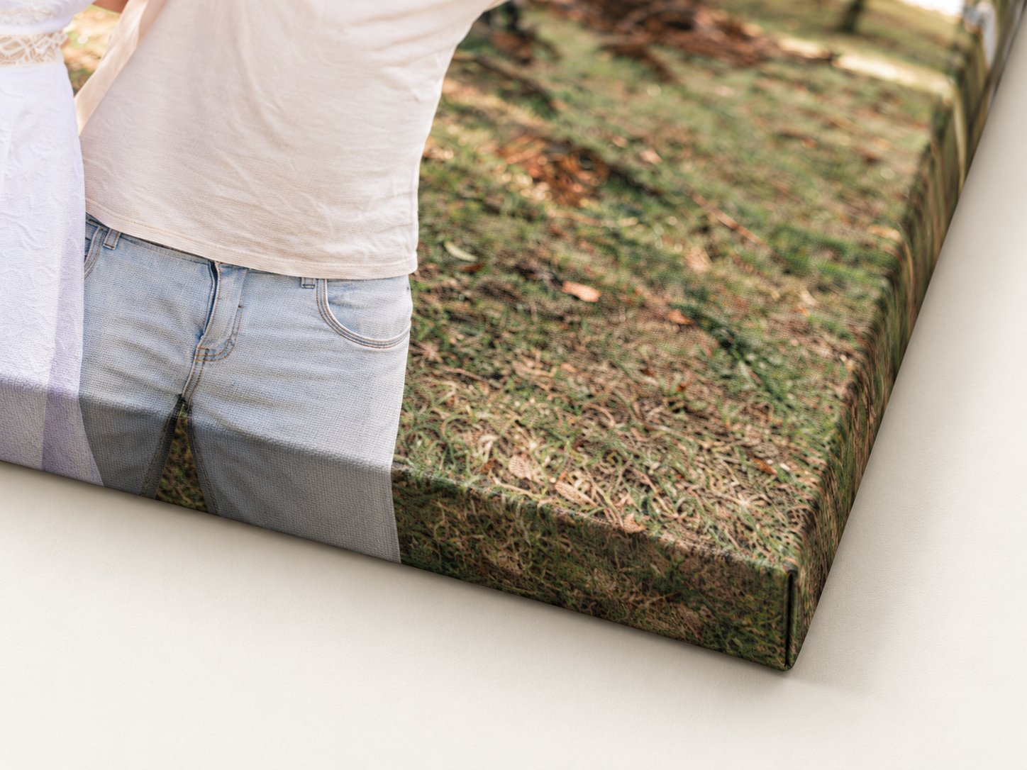 Product mock-up showing a family photo canvas corner, canvas texture and both wrapped edges