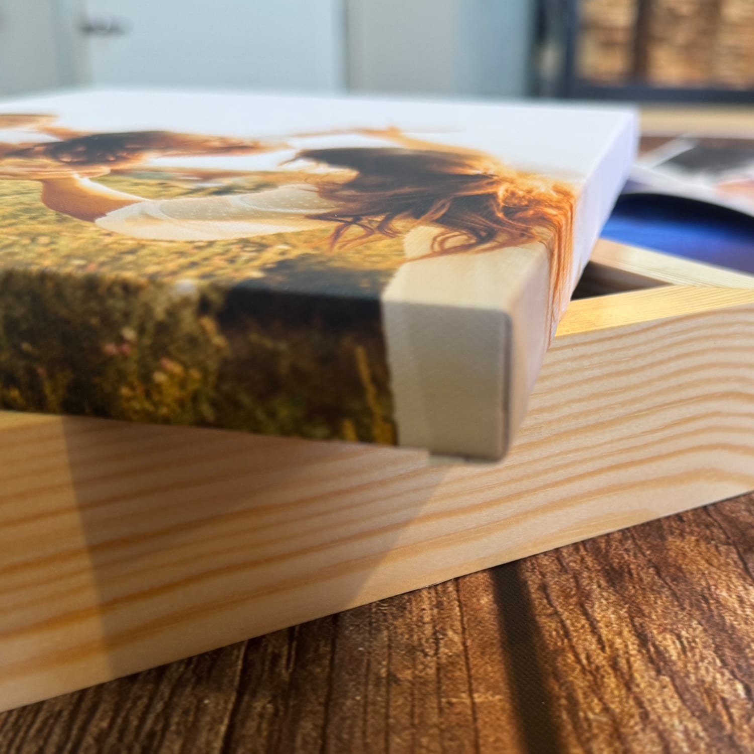 Close-up of a neatly folded gallery-wrapped canvas corner