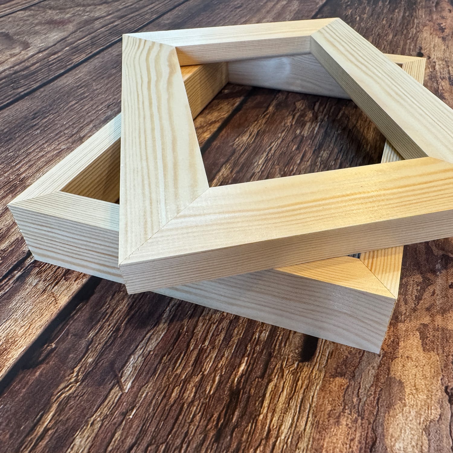 Solid pine canvas stretcher frames used in our West Yorkshire workshop