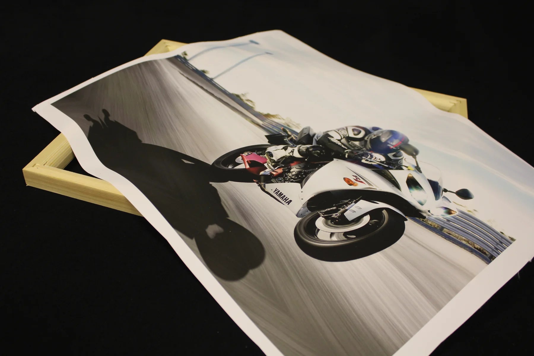 Freshly printed canvas laid over a wooden stretcher frame before finishing