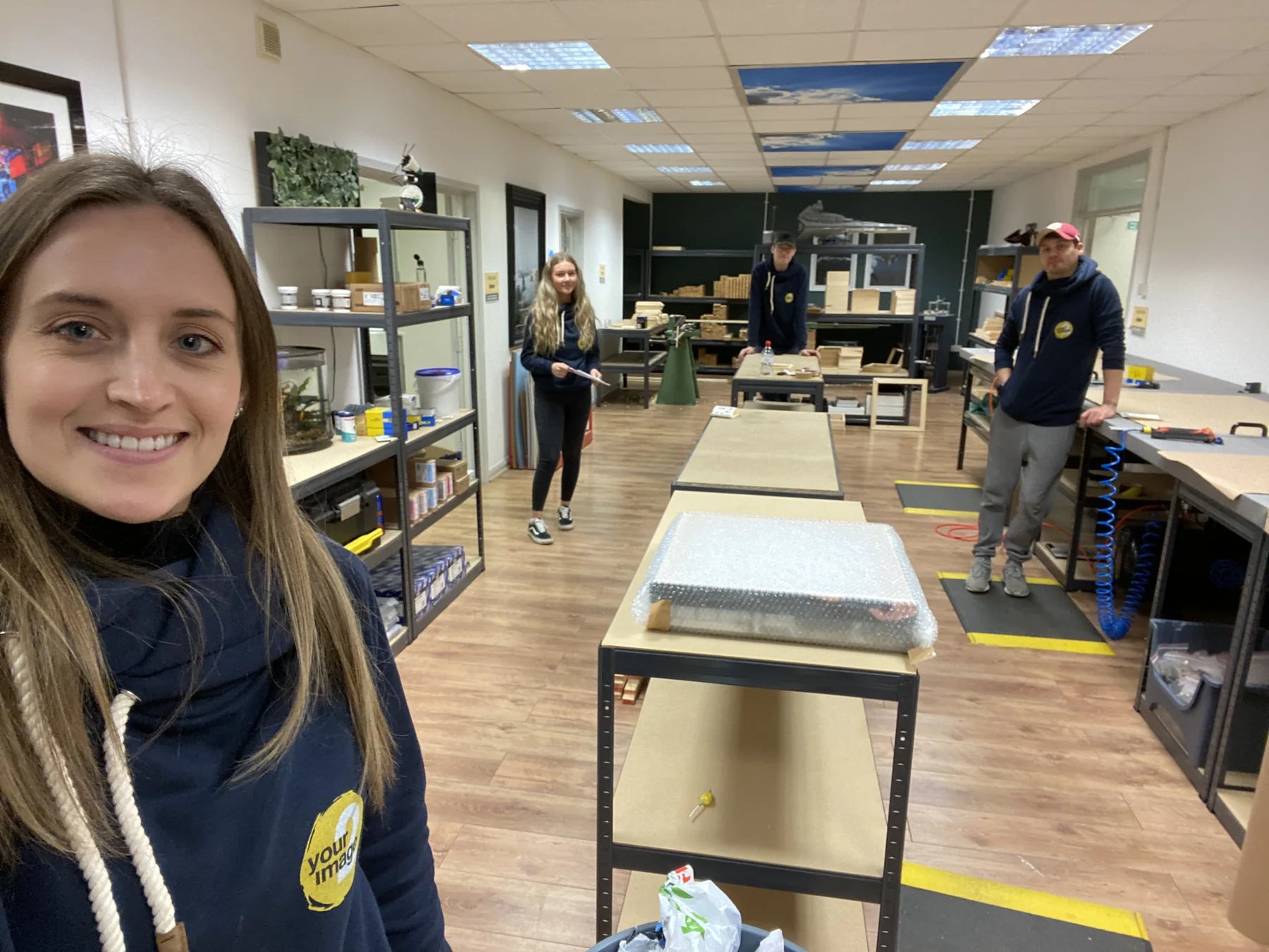 Three members of the YI2C team together in the working print room
