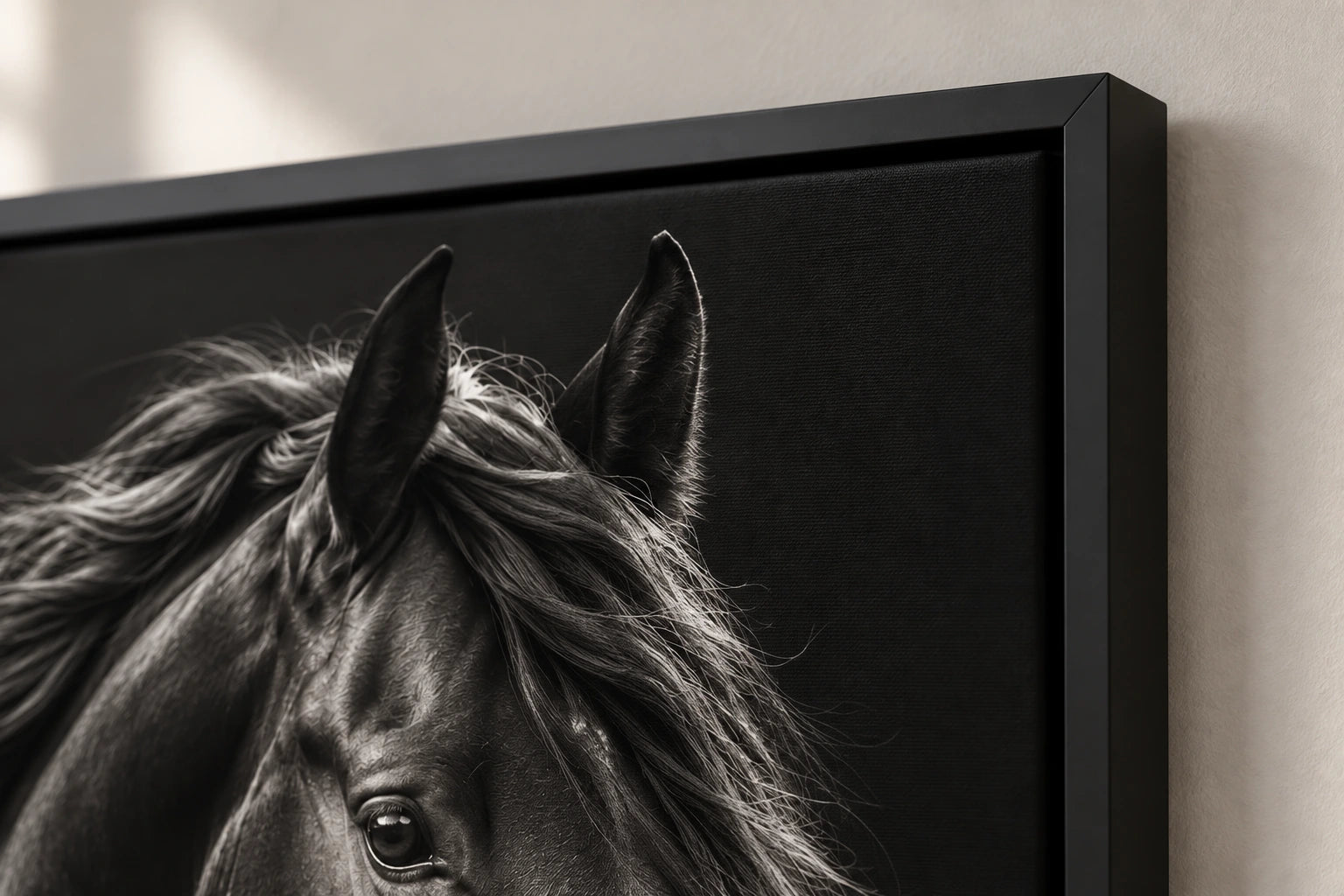 Illustrative close-up of the black floating-frame corner and the edge of the same horse canvas.
