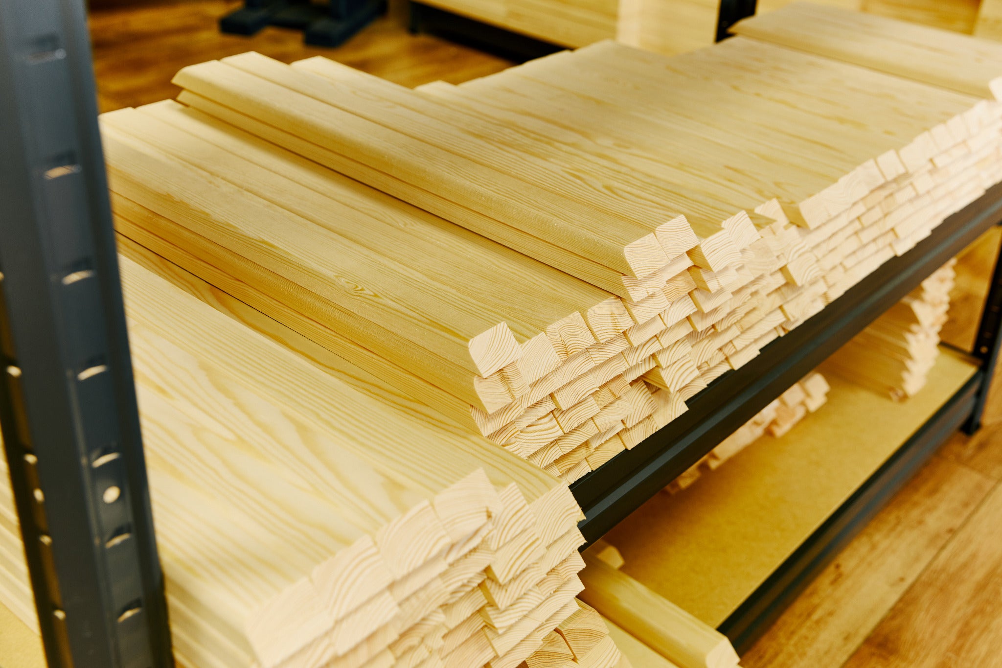Stacks of pine stretcher bars ready for making canvas frames.