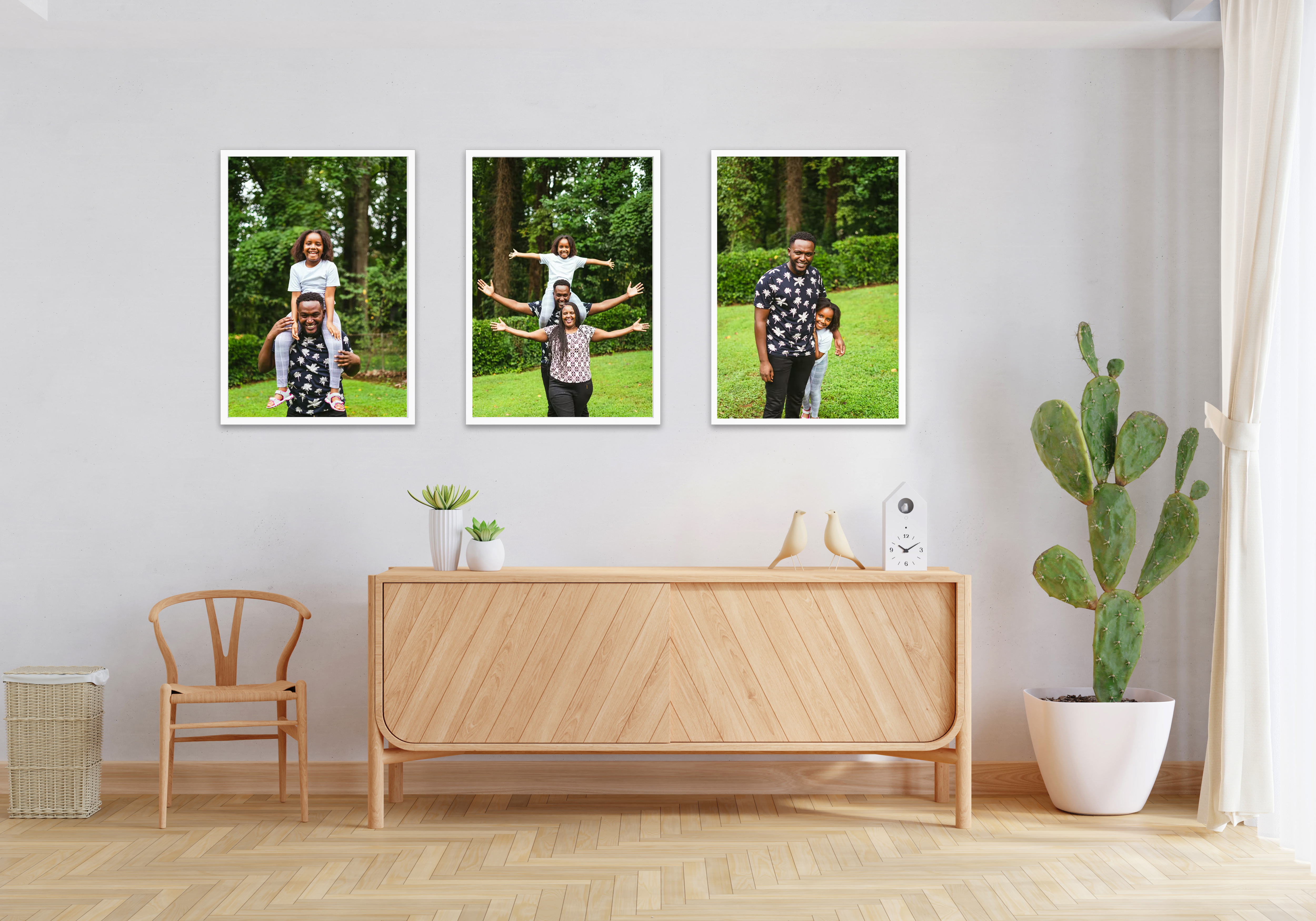 Three family photos of mother, father and daughter displayed in beautiful custom white picture frames