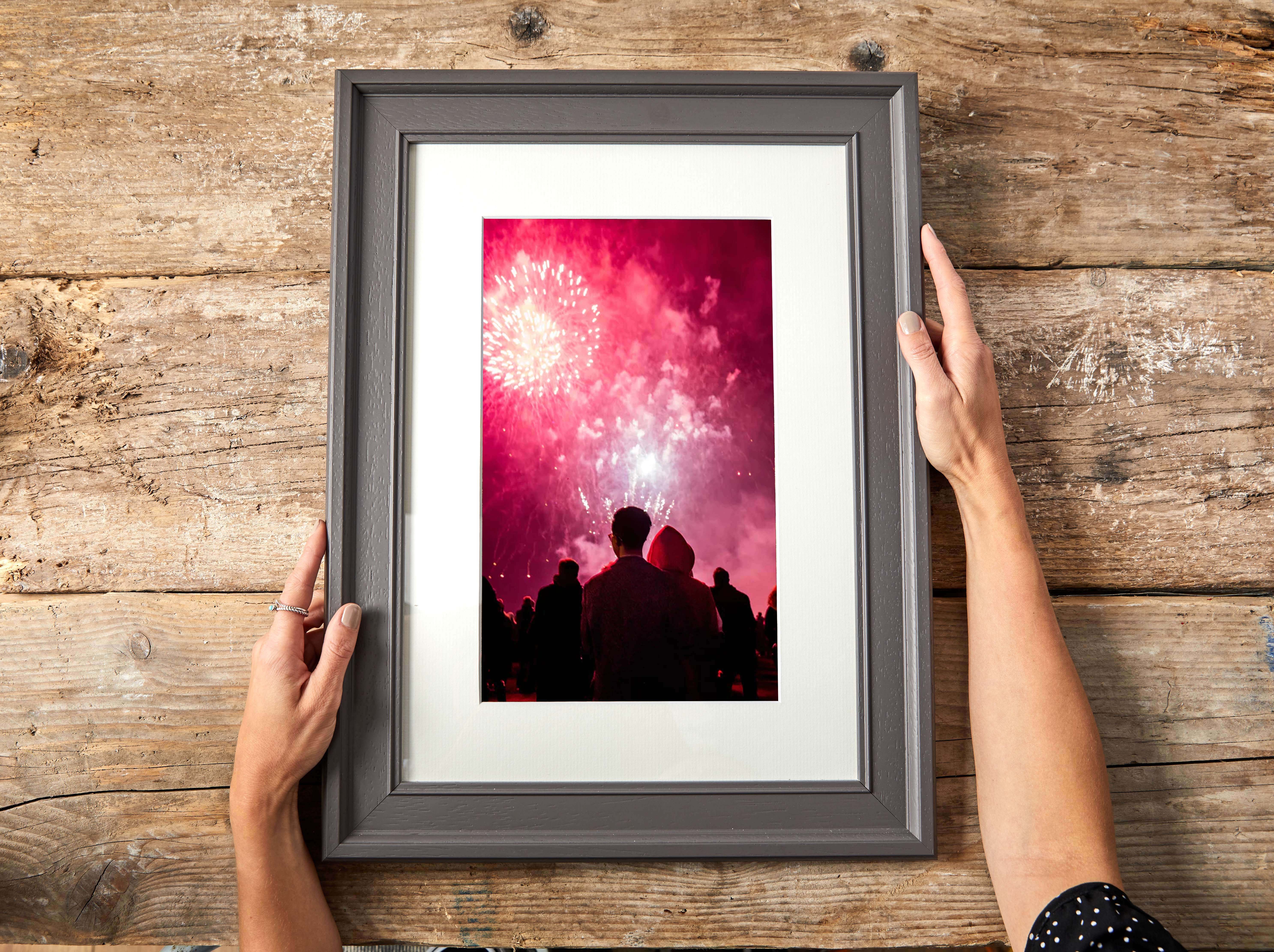 A colourful bonfire night photograph printed onto cheap canvas and displayed in a custom frame