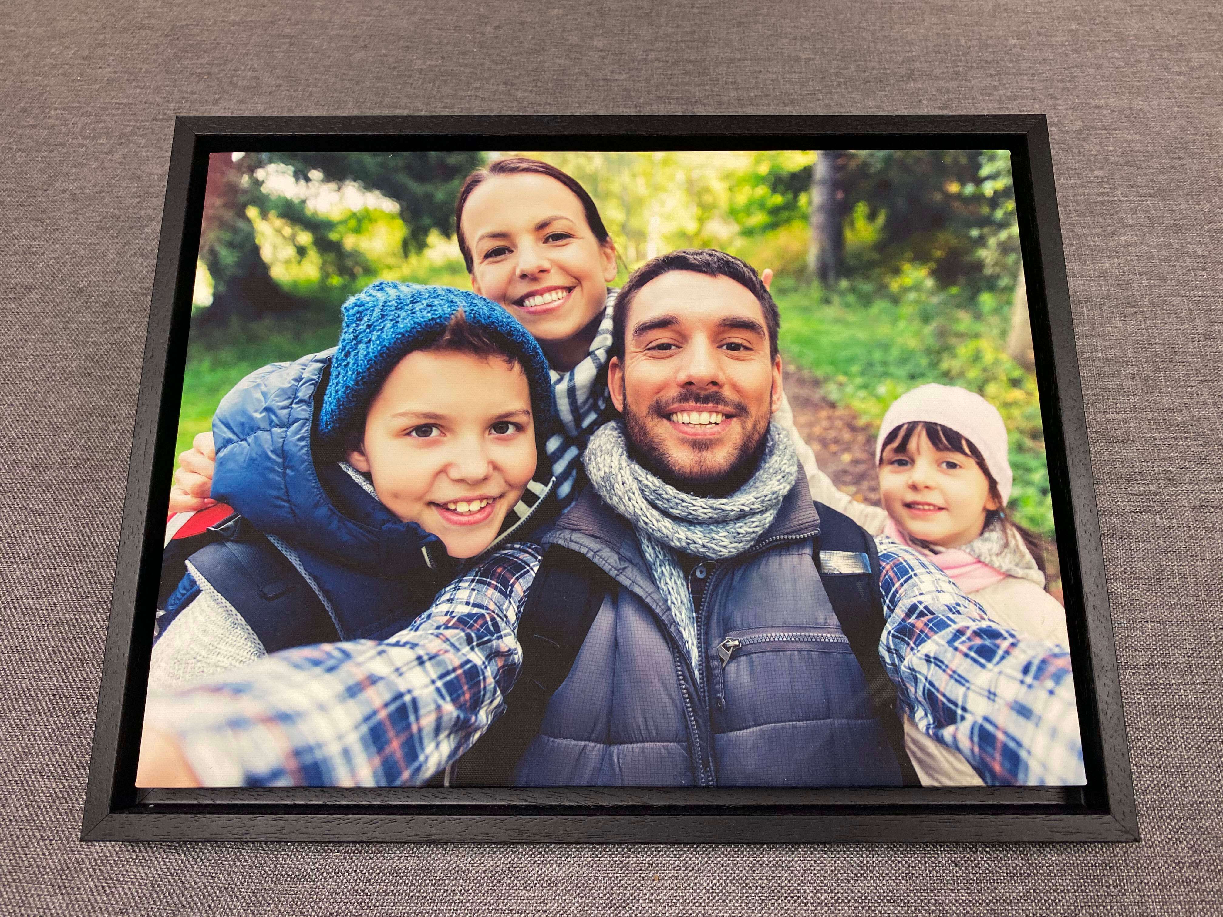 A family selfie taken on a walk in nature transformed into a quality affordable custom canvas print with a classic made to order black frame