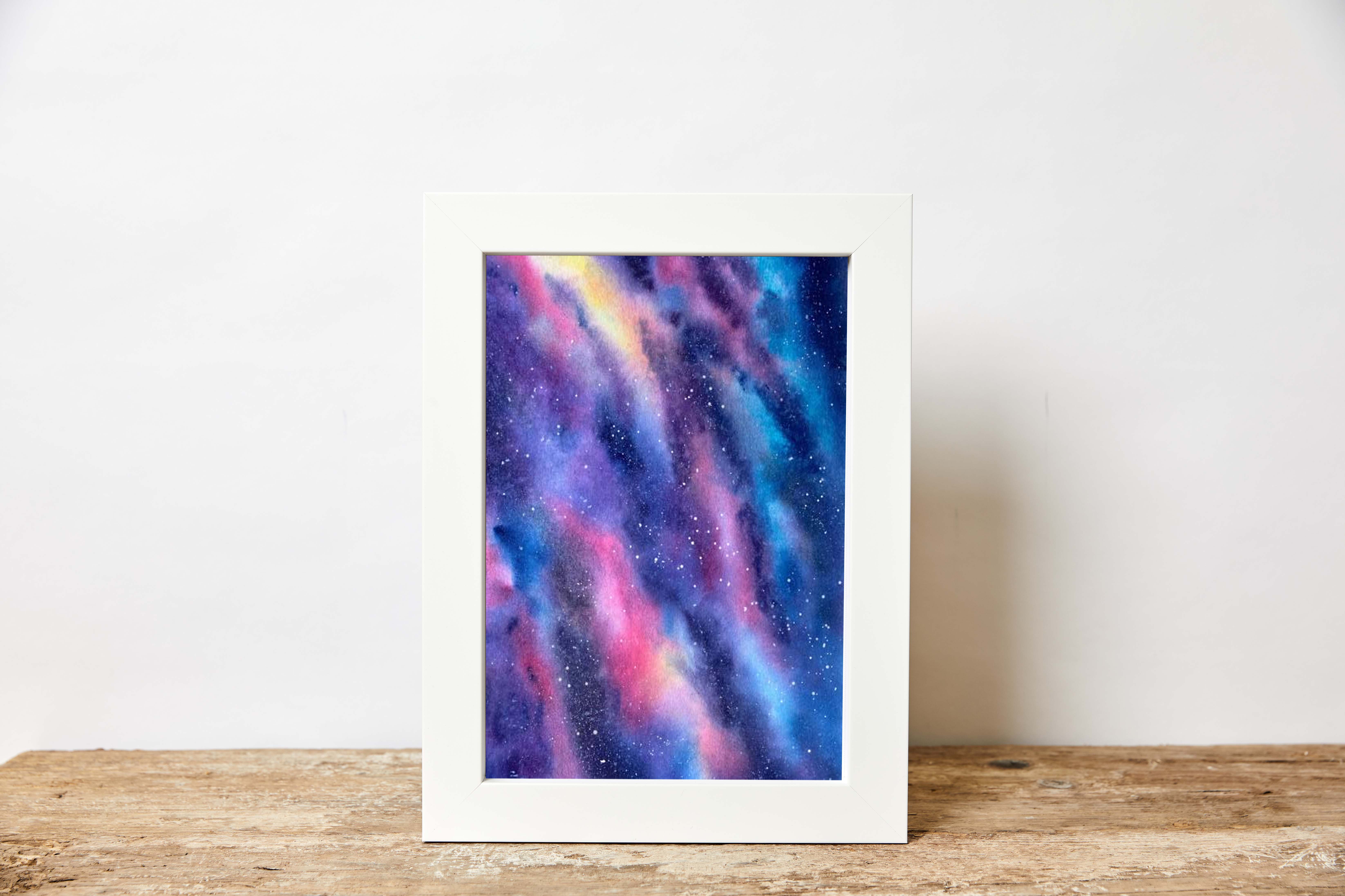 Beautiful painting of the galaxy printed into a custom quality white frame with free next day delivery UK