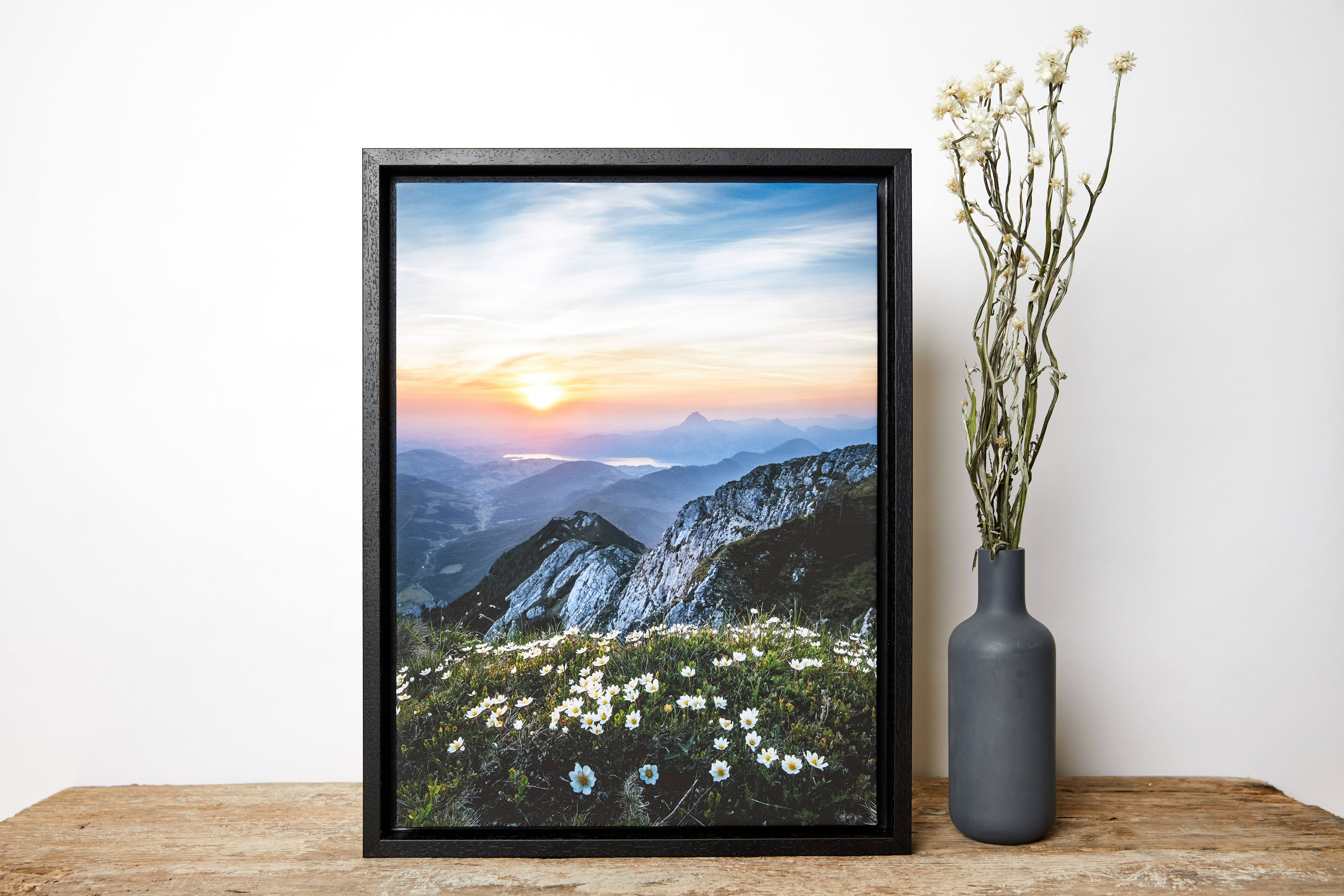 Beautiful spring landscape photography of beautiful sunrise scenery and flowers displayed inside one of our custom black canvas floater frames