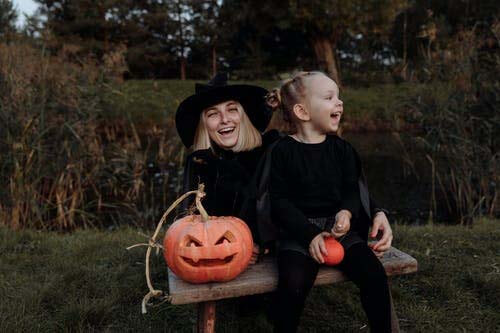Photograph of mother and daughter dressed up in their halloween costumes is a perfect memory to print onto canvas and even frame to display in your home.